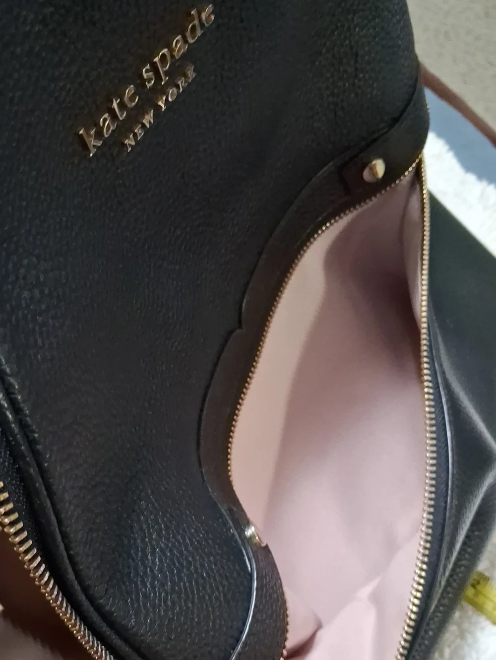 kate spade black pebbled leather backpack with gold hardware